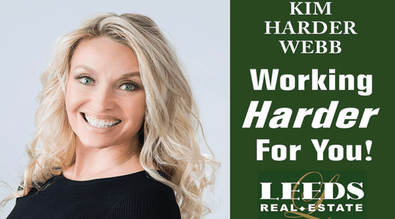 Real estate advertisement with smiling woman