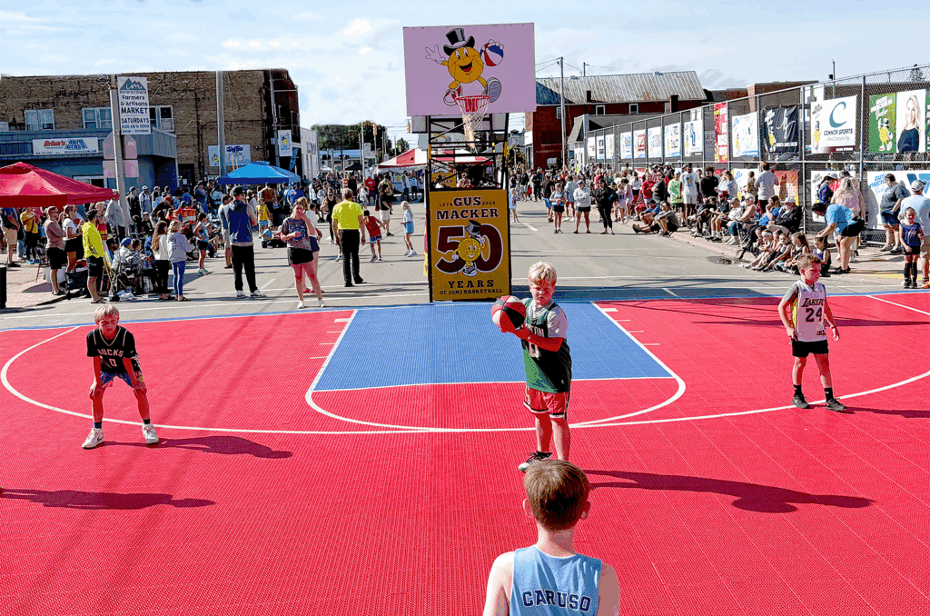 Street basketball event with spectators watching