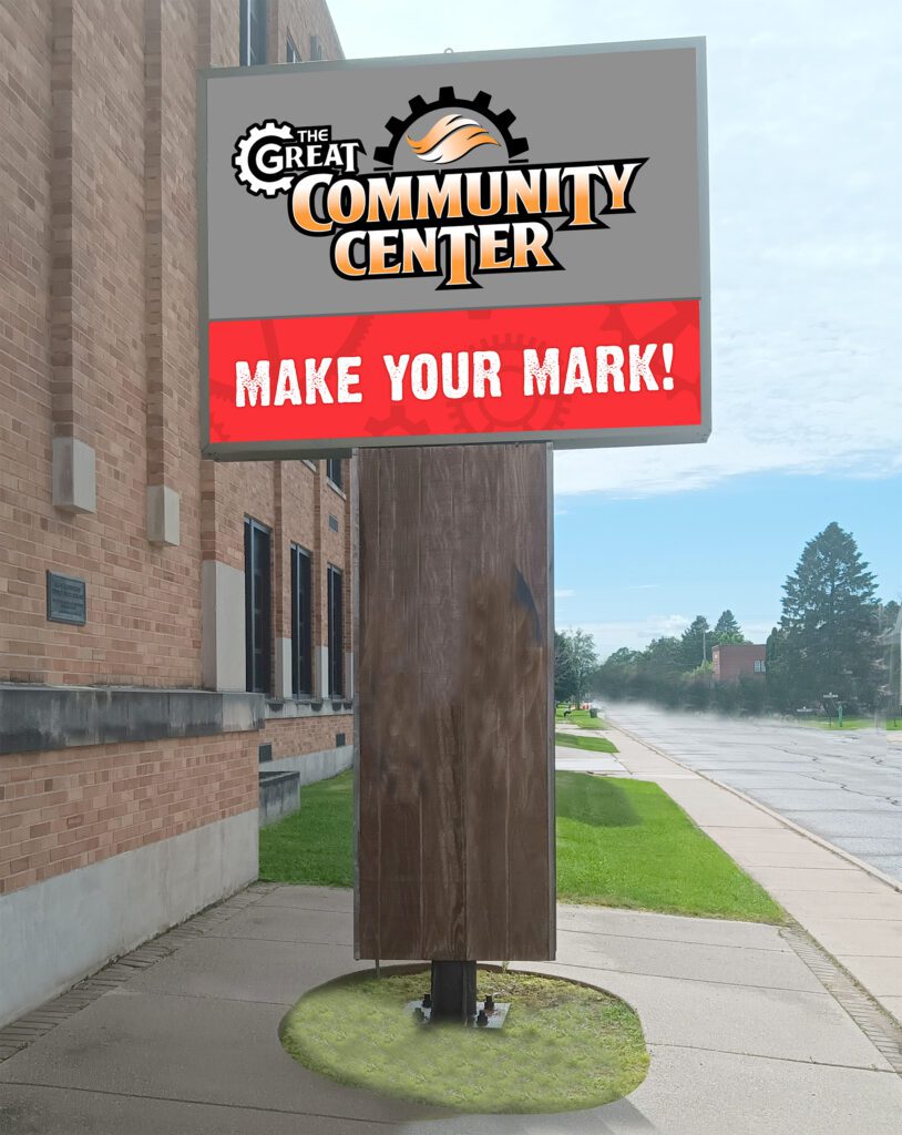 A community center sign with 'Make Your Mark!' message.